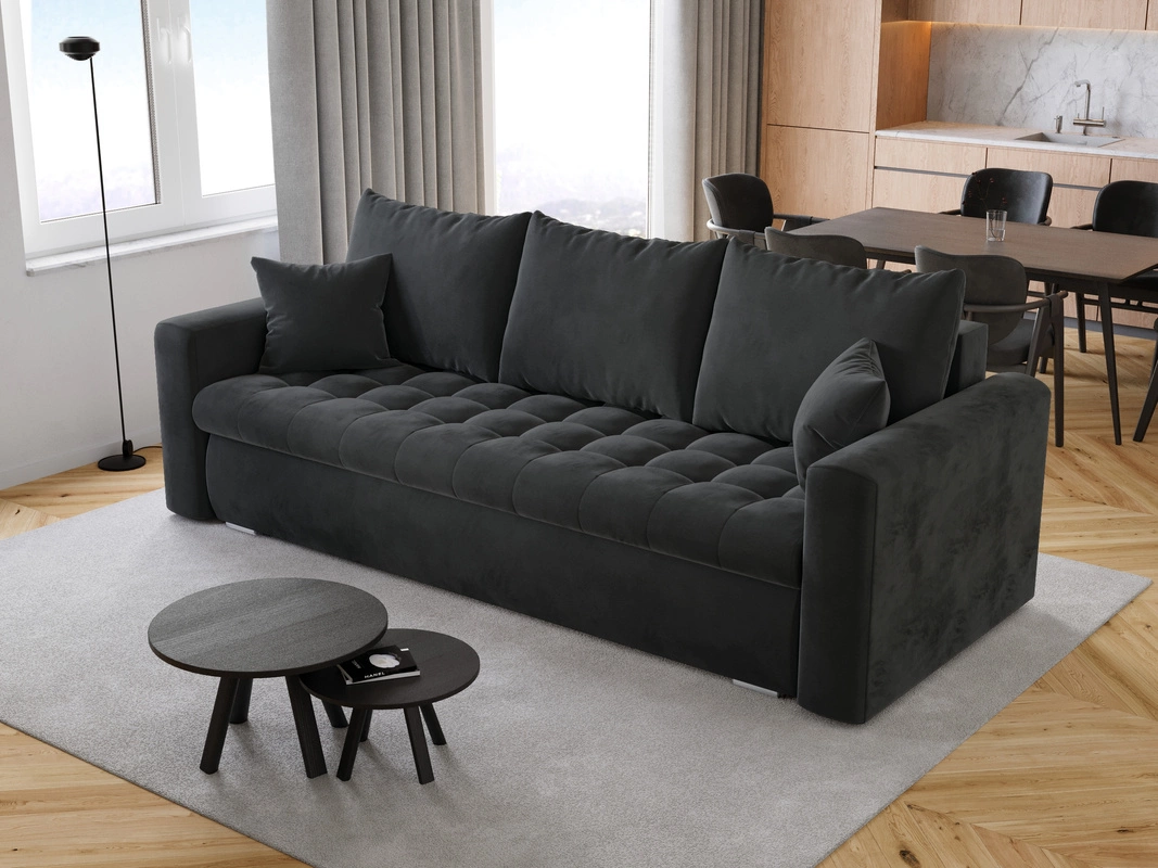 Ciemnoszara kanapa w salonie: jakie dodatki i kolory do niej pasują?