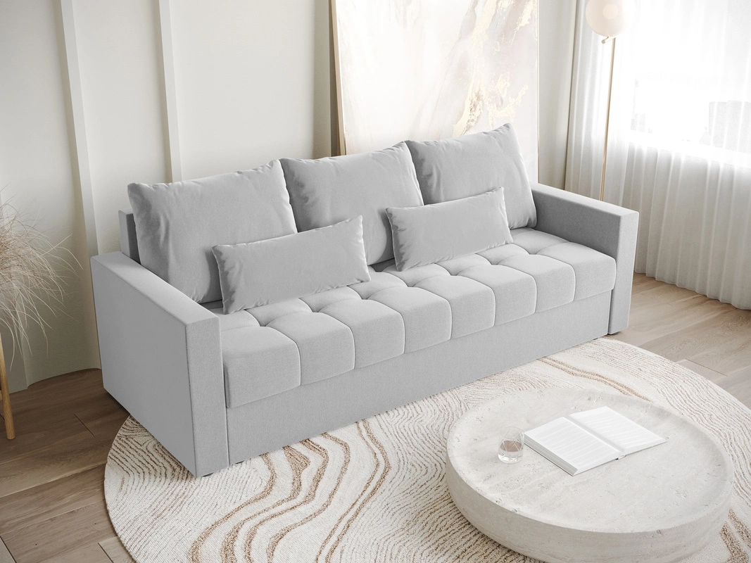 Szara kanapa, beżowe ściany - jak ożywić takie połączenie w salonie?